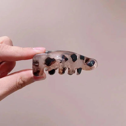 Women's Vintage Oval Leopard Print Non-Slip Hair Clips - Amber and Black Fashion Accessories for Secure Ponytails and Bun Hairstyles